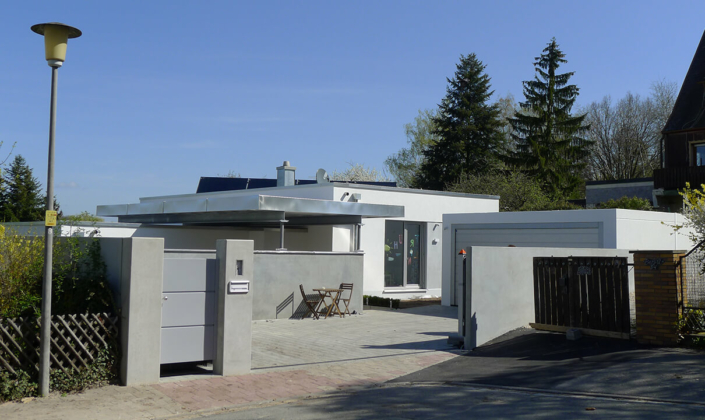 Rost-Wohnbau Einfamilienhaus Energiesparhaus Eigentumswohnungen mit Garage und Terrasse