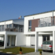 Rost-Wohnbau Energiesparhaus Immobilie Einfamilienhaus mit Balkon und Garage