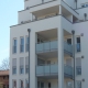 Rost-Wohnbau Energiesparhaus Immobilie Mehrfamilienhaus mit Balkon