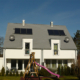 Rost-Wohnbau Doppelhaushälfte Energiesparhaus Eigentumswohnungen mit Garten