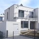 Rost-Wohnbau Doppelhaushälfte Energiesparhaus mit Terrasse und Garage