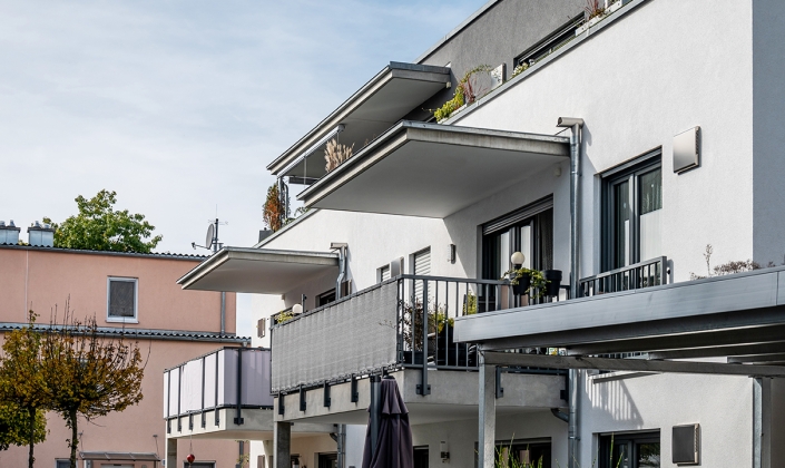 Rost-Wohnbau Reihenhaus Energiesparhaus mit Balkonen